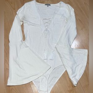 Charlotte Russe Cream Lace-Up Bodysuit